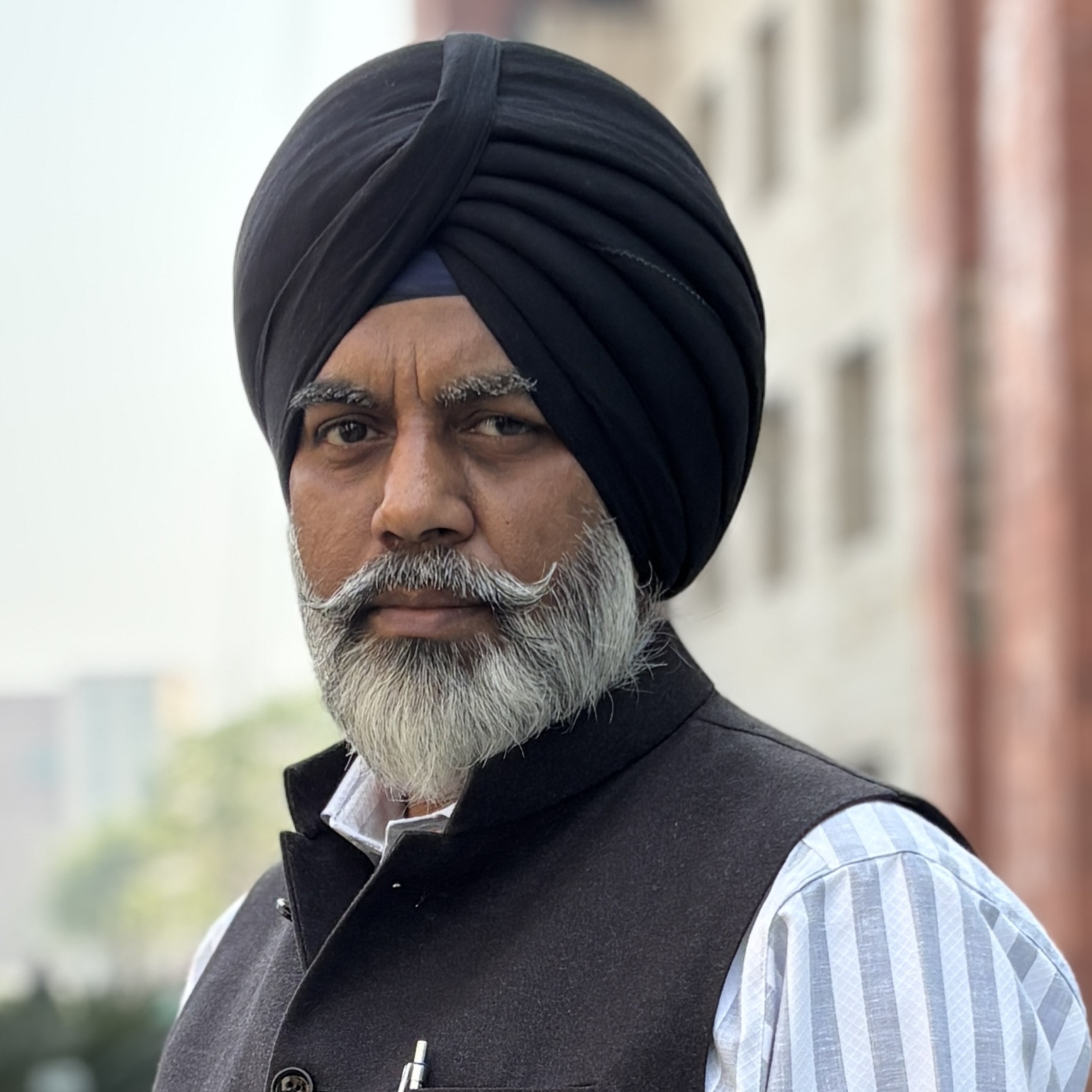 Dr. Satvir Singh